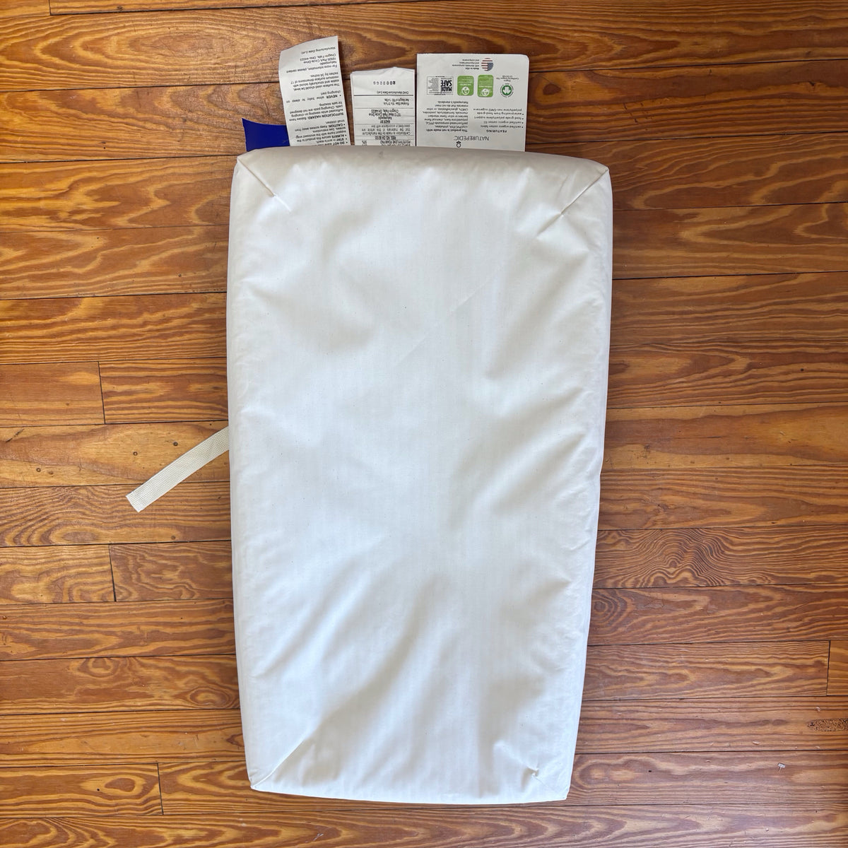 Naturepedic with 2 covers changing pad